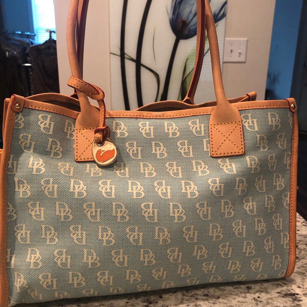 Darling, Never Used Dooney & Burke Small Tote w/Drawstring Pockets. Asking $100